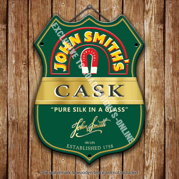 john-smiths-cask-beer-advertising-bar-old-pub-drink-pump-badge-brewery-cask-keg-draught-real-ale-pint-alcohol-hops-shield-shape-metal-steel-wall-sign