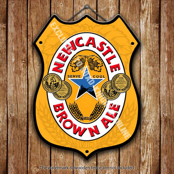 newcastle-brown-ale-newky-beer-advertising-bar-old-pub-drink-pump-badge-brewery-cask-keg-draught-real-ale-pint-alcohol-hops-shield-shape-metal-steel-wall-sign